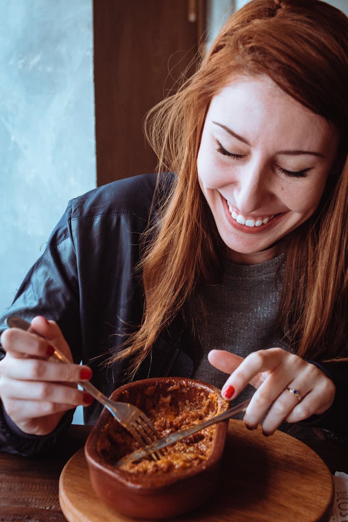 Photo Of Woman Eating Food